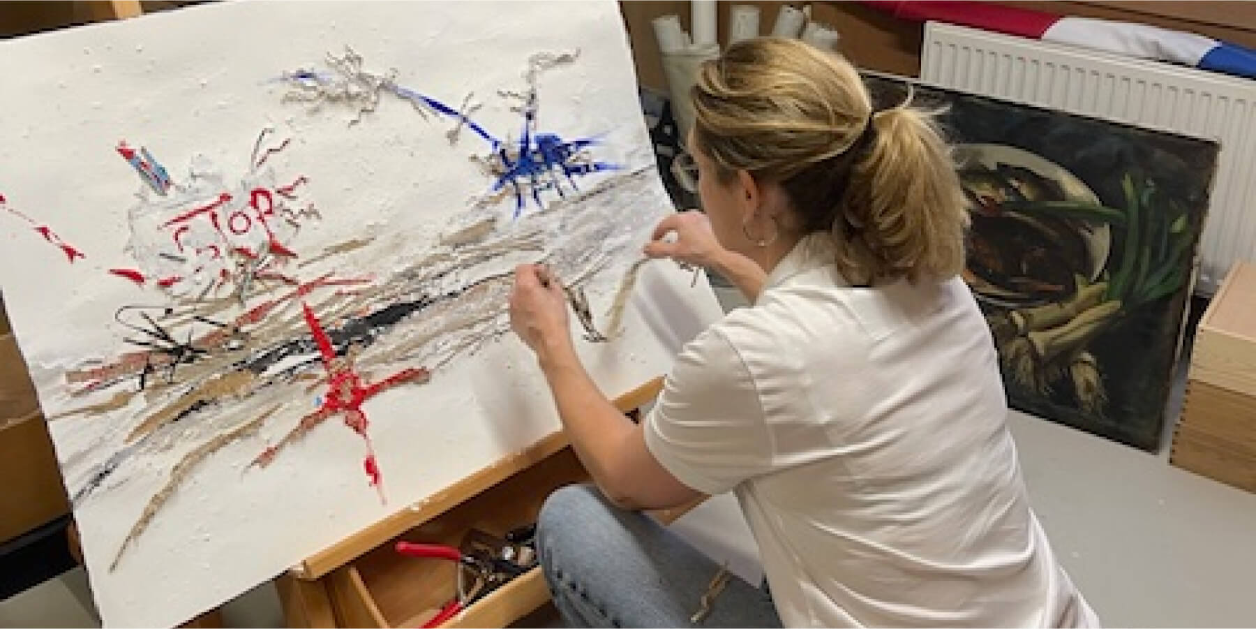 Merel working on artwork
